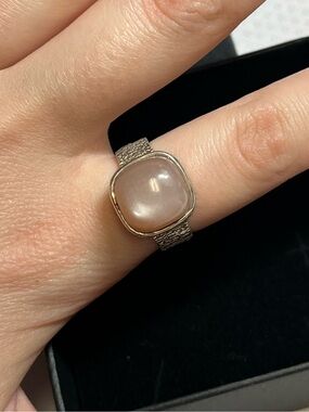 Sterling silver ring with pink stone
Stamped 925
Size 8
Thick band